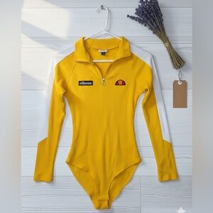 ELESSE LINARI Women’s Yellow Long Sleeved Bodysuit with a Half Zip High Neck